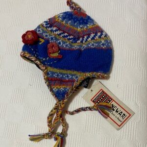 COLORFUL KNITTED EARFLAP HAT WITH FLORAL KNITTED ACCENTS